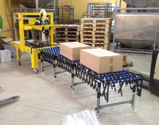 Nastratrice Quindici.jpg Linea di nastratura scatole - Azienda frutta secca - Quindici (AV)